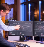 two-colleagues-working-late-office-blue-light-night-view_482257-32812